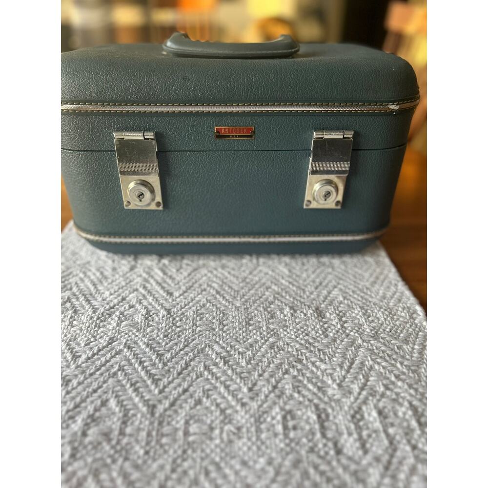 Antosek over night case with lock and key.